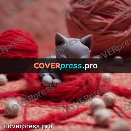 Clay figurine: kitten asleep in yarn