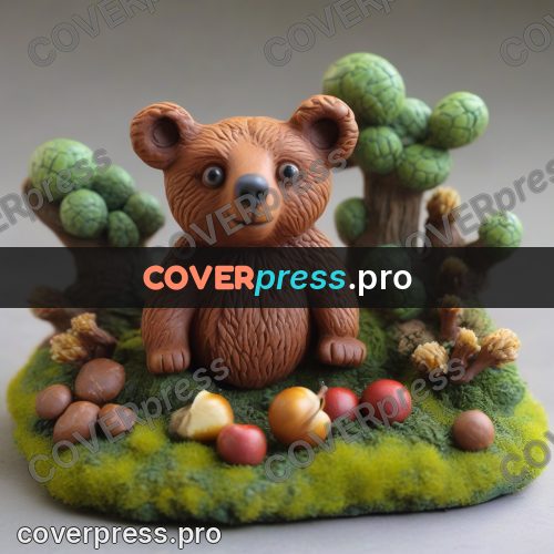 Clay sculpture: bear cub sitting in greenery