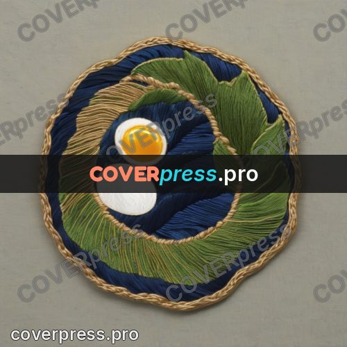 Embroidery design: blue field with a green leaf
