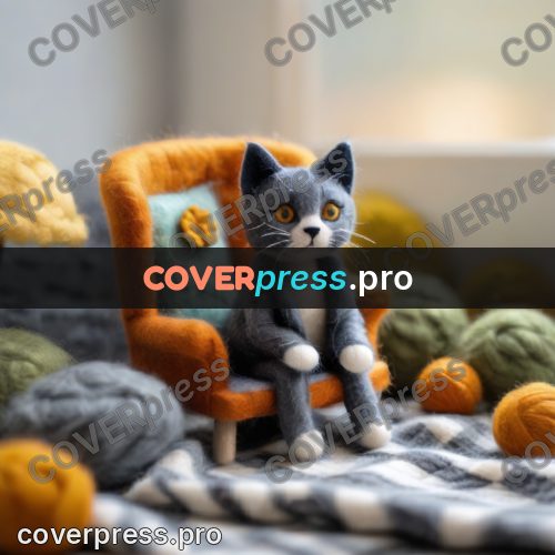Wool painting: grey kitten indoors