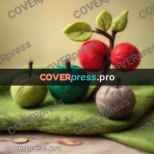 Wool painting: apple on a green mound
