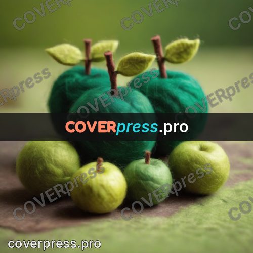 Wool painting: apple on a green mound