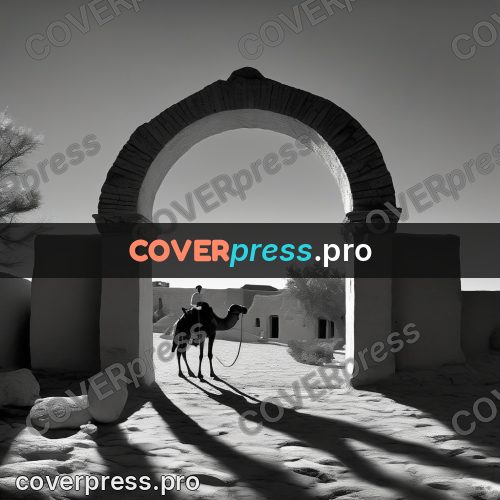Black and white photo: arch with a bright opening