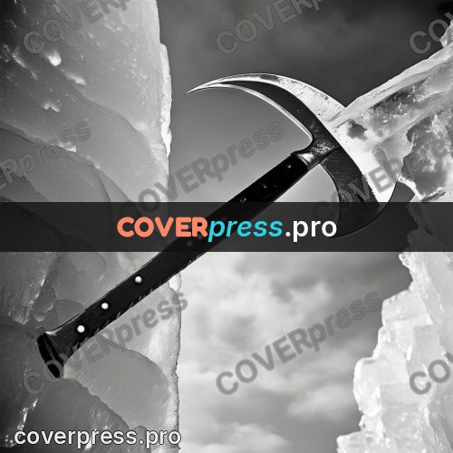 Black and white photo: ice tool driven into the ice