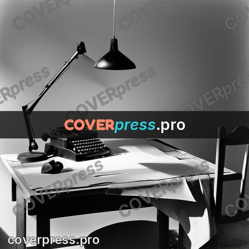 Black and white photo: writing desk with a lamp