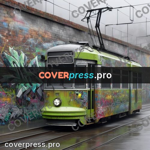 Graffiti illustration: sprayed tram by a wall