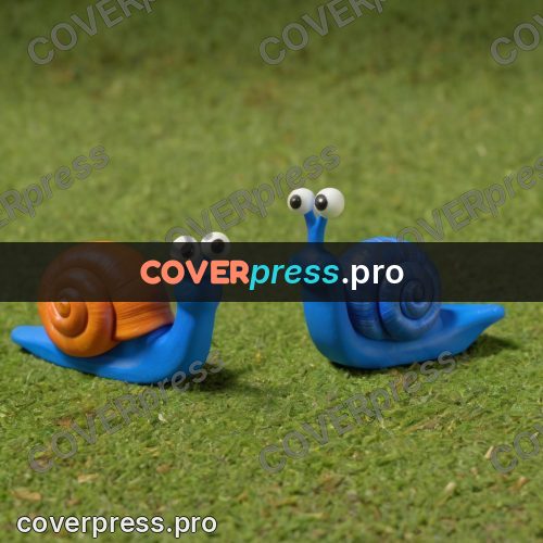 Stop motion character: blue snail with an orange shell