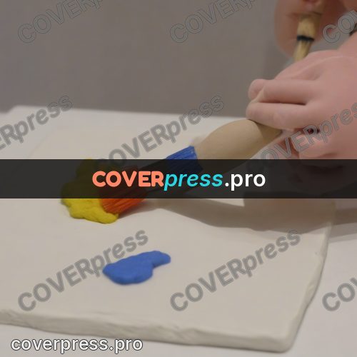 Stop motion character: hand with a brush on clay