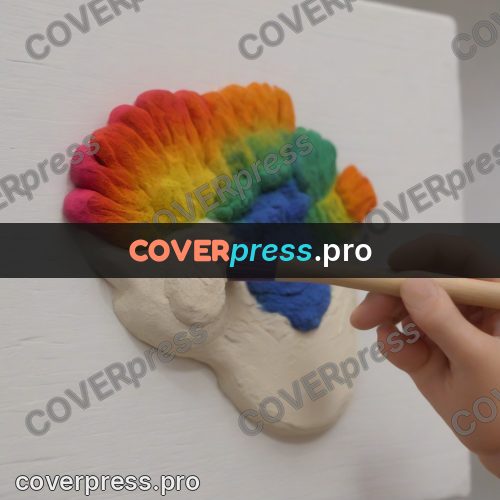Stop motion character: hand with a brush on clay