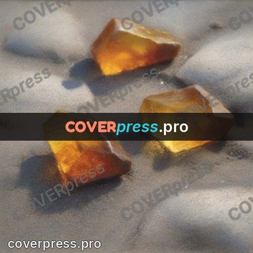 Soft pastel painting: pieces of amber on grey sand