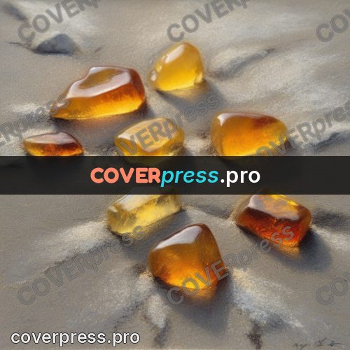 Soft pastel painting: pieces of amber on grey sand